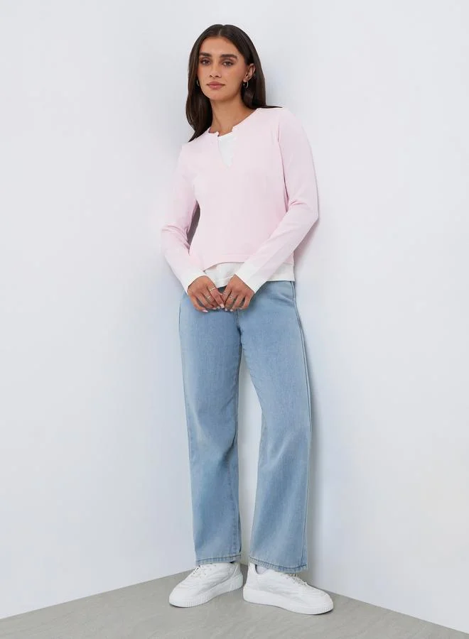 ستايلي بلوزة وردي بأكمام طويلة بتصميم 2 في 1